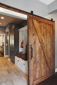 Sliding Doors Like This Wooden Barn Door Allow Rooms To Be Hidden Wooden Barn Doors Home Interior Barn Doors