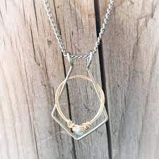 The Best Ring Holder Necklaces You Can Buy Emmaline Bride Wedding Ring Necklaces Ring Holder Necklace Wedding Ring Necklace Holder