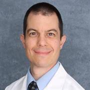 Justin K. Scheer, MD