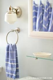 These bathroom organization ideas will help keep your toiletries, towels and display pretty perfumes and creams you use daily on a small shelf. Small Bathroom Ideas Clever Organizing And Design Ideas Balancing Home
