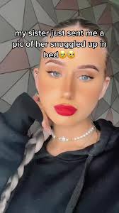 Cozy Sister Snuggle in Bed Photo