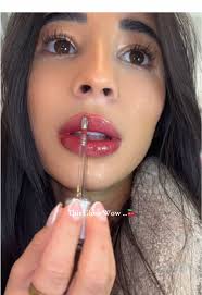 This Gloss wow look at the color and the consistency is watery it is not  sticky like the common gloss 😍 . #gloss #glossylips #glossy #koreanmakeup  #lips