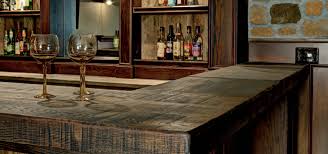 Essentials such as a bar table and a set of chairs. 43 Unique Custom Bar Top Ideas Sebring Design Build Design Trends