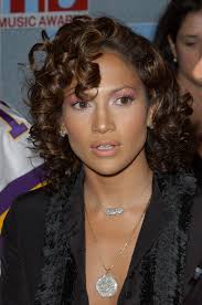 Jennifer lopez steps out with a younger shorter new look from us.hola.com. Jennifer Lopez Medium Curls Jennifer Lopez Hair Looks Stylebistro