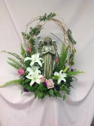 Angel In The Garden Funeral Flower Arrangements Funeral Floral Funeral Floral Arrangements