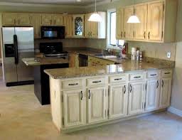 Distressed Black Kitchen Cabinets In An Old Look Distressed Kitchen Cabinets Distressed Kitchen Rustic Kitchen Cabinets