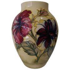 Maybe you would like to learn more about one of these? Vintage Moorcroft Pottery Vase In The Hibiscus Flowers Pattern England Estate At 1stdibs