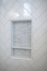 Shower Niche The Shower Niche Features Marble Mosaic Tile Showerniche Showernichetie Shower Niche Tile Shower Niche Subway Tile Showers Shower Niche