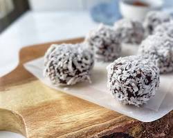 snowy berry nut energy bites balls coated in coconut flakes, AI generated