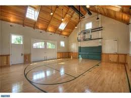 16 Homes With Basketball Courts You Can Buy Now Home Basketball Court Basketball Court Indoor Basketball Court