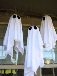 Millions of people spend thousands of dollars on halloween decorations for their home and yard. Spooky Hanging Ghosts Revisited Hanging Ghosts Hanging Ghost Decoration Halloween Hanging Ghost