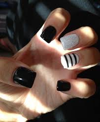 Black nails, like a small black dress, will never lose its relevance. 50 Sassy Black Nail Art Designs To Add Spark To Your Bold Look