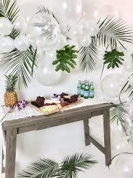 Tropical themed balloon decorations | boxwood hedge backdrop. Tropical Chic Charcuterie Table Kara S Party Ideas Tropical Decor Party Tropical Birthday Party Tropical Party Decorations