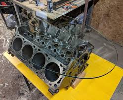 I first made one of these 6 years ago as i needed a coffee table in the lounge room at home, but i wanted something cool and a bit different. Made A Coffee Table From A Salvaged Truck Engine Block I Found In A Field Album On Imgur