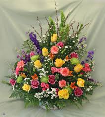 Flowers for memorial service near me. Bright Celebration In Amherst Ma Atkins Farms Flower Shop