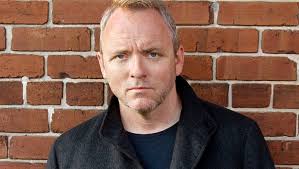 Dennis Lehane drinks in some sunlight