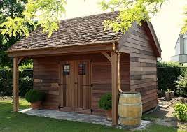 Tuinhuis Met Strodak Met Dakpannen Realisaties Wood Arts Tuinhuis Tuinhuizen Achtertuin Schuurtjes