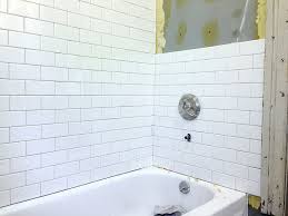 If the tub is level, start with a full tile at its rim. Installing Subway Tile In Our Victorian Bathroom Rehab Dorks