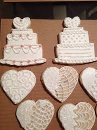 Wedding Cake Cookies Along With Heart Shaped Cookies Wedding Cake Cookies Cookie Decorating Wedding Cookies