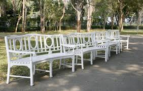 Beautiful shade bench with an arched canopy decorated with small square perforations. Row Of White Park Benches 1987492 Stock Photo At Vecteezy