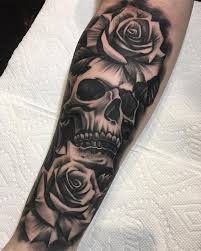 Skulls And Roses Are Always Funnnnn Undertheguntattoo Tattoo Art Hollywood Losangeles California Hand Tattoos For Guys Rose Tattoos Skull Sleeve Tattoos