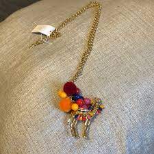 Kate spade (wkru5142) spice things up camel sammi backpack bagfrom $149.00 kate spade spice things up camel crossbody red beige new novelty nwt bag from $179.99 kate spade spice things up camel pendant necklace with dust bagfrom $54.99 Kate Spade Jewelry Nwt Kate Spade Spice Things Up Camel Necklace Poshmark