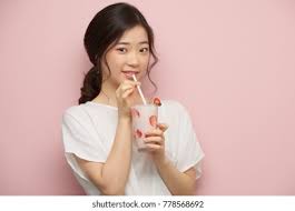 They tend to be extremely. Korean Young Woman Drinking Strawberry Milkshake Stock Photo Edit Now 778568692