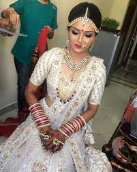 Varsha Gidwani Portfolio Bridal Makeup Bride Wearing A Silver Choker With A Gre Indian Wedding Fashion Indian Wedding Outfits Designer Bridal Lehenga Choli