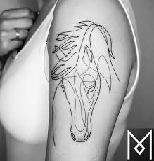 This beautiful tattoo shows a black and gray boat anchor covered in pink and blue flowers done in a minimalist, watercolor style. 45 Unique Horse Tattoo Ideas Simple Tribal Colorful Meaning More
