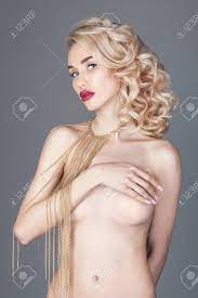 Fashion Beauty Nude Blonde Woman On A Light Background. Girl With Jewels On  The Arms And Neck. Skin Care And Beautiful Makeup Perfect Girls. Luxury  Woman With Elegant Curly Hair Фотография, картинки,