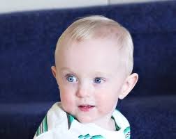 Dying baby gains strength in his parents' loving arms