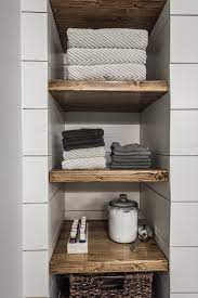 I have to confess that while things might have been quiet here on the blog during the holidays, we were super busy behind the scenes working on a few projects that were way overdue. Irwin Farmhouse Before After Part Iii Bathroom Addition Farmhouse Master Bathroom Bathroom Storage Shelves