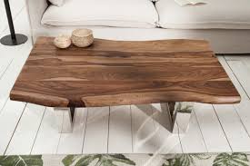 It's made from solid pine and pine veneers in a natural finish that showcases all the variations in the wood grain. Casa Padrino Designer Solid Wood Sheesham Coffee Table Natural Brown 110 X H 40 Cm Living Room Table