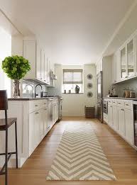 Long and narrow kitchens are often called 'galley kitchens', because they mimic the layout found on ships. Love This Gally Kitchen The Long Countertop Can Be Transformed Into A Buffet When Needed And It S Wide Enough To Have A Fe Galley Kitchen Design Kitchen Layout