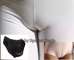 The contour in the fabric of a lower garment (e.g. Crossdresser Camel Toe Gaff Absolutely Special Trade Gmbh