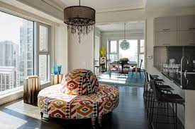 Enhance your home with a tasteful upholstered bench or settee to create additional comfort and storage in your entryway and living room. Design Debate Will A Circular Settee Make Your Home Look Like A Hotel Lobby Wsj