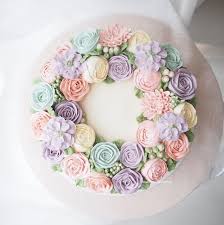 Our signature floral birthday cake may look good enough to eat, but it's actually crafted from fresh pastel flowers such as mini carnations and poms. 8 Bespoke Buttercream Flower Cake Buttercream Flower Cake Buttercream Flowers Flower Cake
