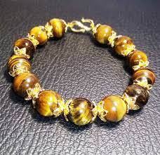 Vintage tiger's eye gold statement ring $745.00. Natural Tiger Eye With 18k Gold Plated Brass Cover Bracelet With Box Buy Sell Online Best Prices In Srilanka Daraz Lk