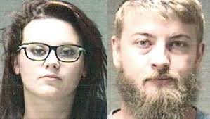 Parents arrested after toddlers found in dirty diapers near railroad tracks 