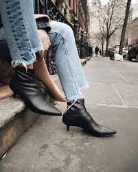 Black Boots With Jeans Get The Shoes Wheretoget Black Heel Boots Kick Flare Jeans Oversized Coat