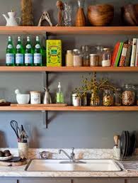 The raw look of the wood accentuates the color contrast between the whites in the kitchen tiles and the warm glow. 32 Floating Kitchen Shelving Ideas Sebring Design Build Design Trends