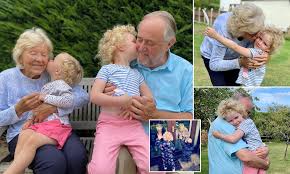 Maybe you would like to learn more about one of these? Two Great Grandparents Gazing At Their Family Through The Glass Are Reunited Four Months Later Daily Mail Online
