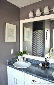 A diy fringed mirror frame. How To Frame Out That Builder Basic Bathroom Mirror For 20 Or Less Bathroom Mirrors Diy Bathroom Mirror Design Bathroom Mirror Frame