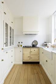A modern kitchen island in chrome or painted in a deeper or contrasting colour to the wall cabinets will make it a focal point in a grey kitchen. 13 Cream Kitchen Ideas That Prove Beige Is Back Real Homes