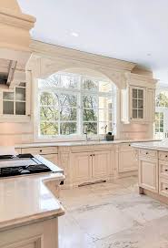 April 4, 2008 at 4:12 am · filed under vanities and tagged: Cream Color Kitchen Cabinets With Marble Counters Stainless Viking Range Stone Tiles Kitchen Cabinet Colors Antique White Kitchen Beige Kitchen