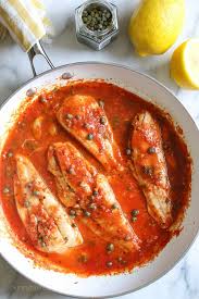 Fish Fillet With Tomatoes White Wine Capers Recipe Recipes Cajun Fish Recipes Fish Recipes