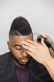 The distinguishing feature of the fringe hairstyle is the longer hair at the front of the head, which forms a waves on your forehead. Haircut Men Man Black Man Hair Trim Hands Face By Starla Little Photo Stock Snapwire