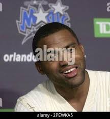 New Orlando Magic guard Cuttino Mobley fields a question during a news  conference at the Magic training facility in Orlando, Fla. Wednesday June  30, 2004. Mobley, Steve Francis and Kelvin Cato were