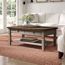 Storage drawers emerge from each end of the boxy. Sand Stable Bonas Solid Wood Coffee Table With Storage Reviews Wayfair