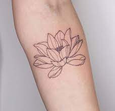 It looks very modest, but it's huge. 26 Lotus Flower Tattoo Designs And Meanings Peaceful Hacks Red Flower Tattoos Lotus Flower Tattoo Design Small Lotus Flower Tattoo